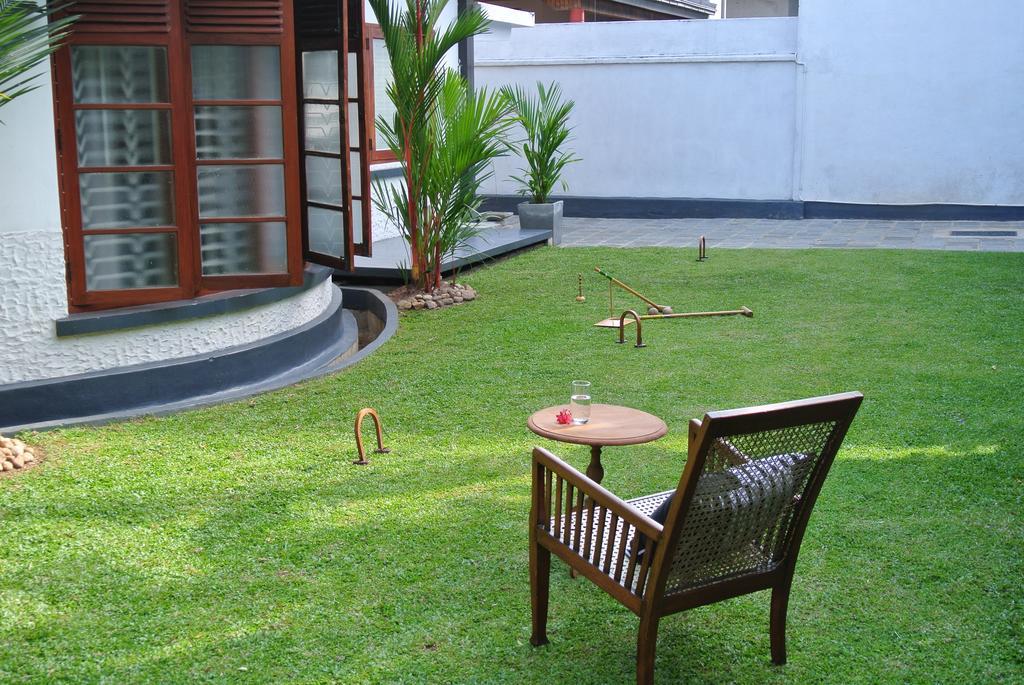 "27" Spathodea- Oasis In The City Colombo Camera foto